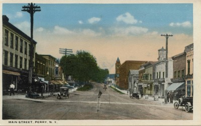 Main Street, Perry, NY. Look at the water tower, background, right.