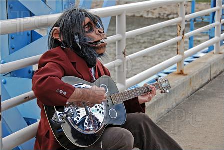 Monk Playing Guitar.jpg