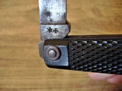 British Army Knife 1943 - Stamps on back of blade.JPG