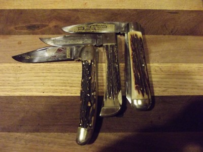 Stag trapper, lockback and folding hunter. the stag on all of these is very nice