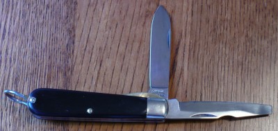 2 holes shallow bail unfinished slant Cam front.JPG