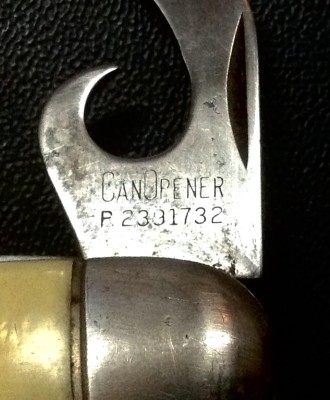 The Can Opener Front Tang Stamp.