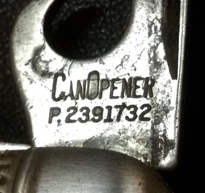 The Can Opener Front Tang Stamp.