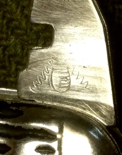 The Glass Cutter Front Stamp.<br />A &quot;Flaming Pineapple&quot;(?)