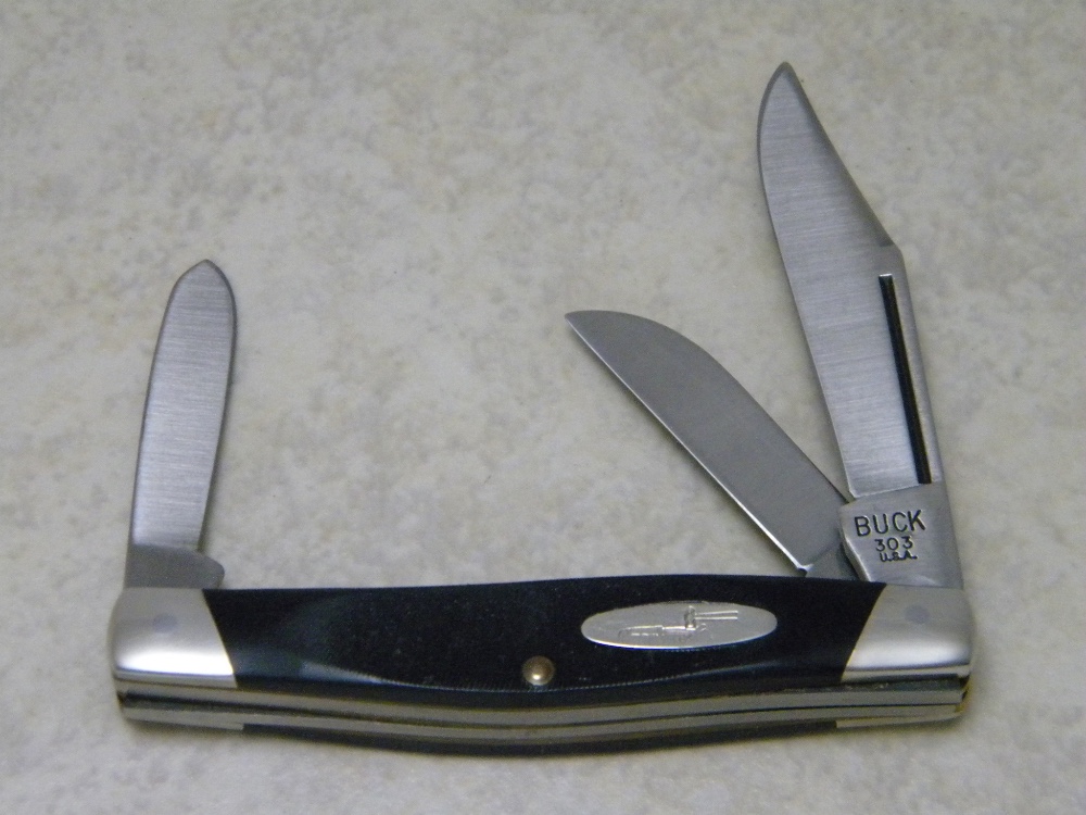 Buck Made in USA (Camillus) Model 303 Cadet Black Saw Cut Delrin