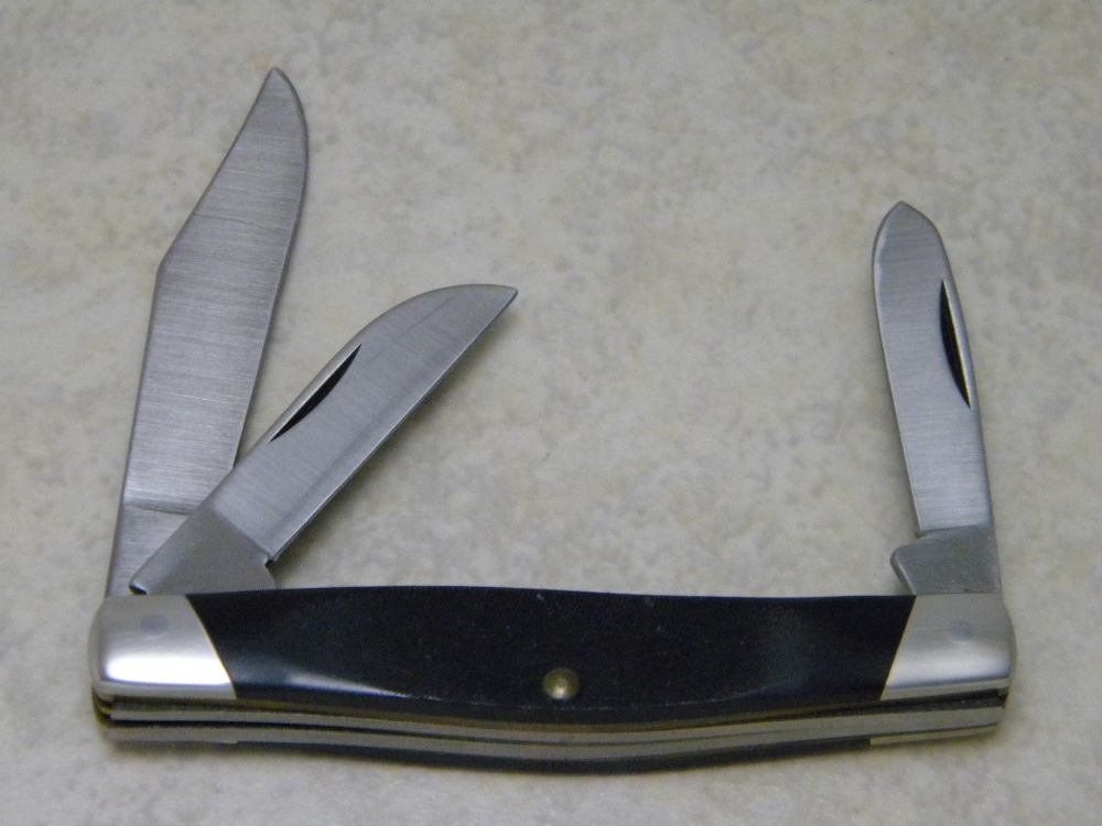 Buck Made in USA (Camillus) Model 303 Cadet Black Saw Cut Delrin