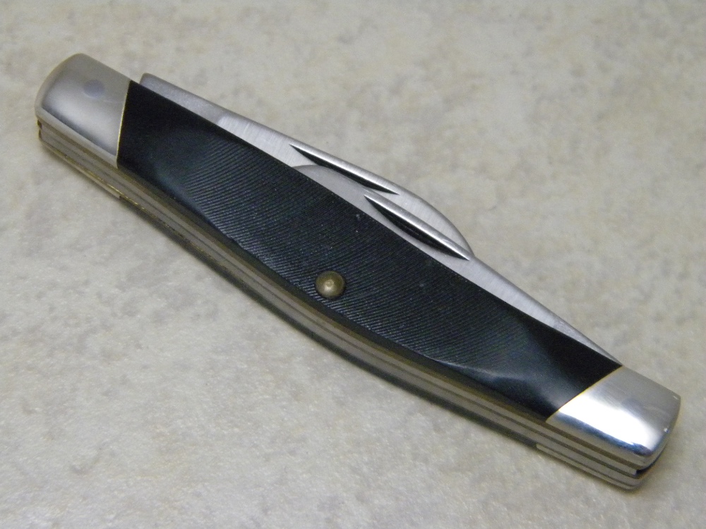 Buck Made in USA (Camillus) Model 303 Cadet Black Saw Cut Delrin