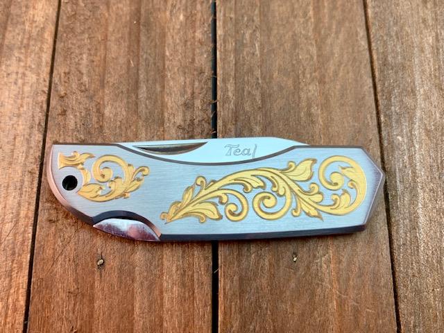 Moki Made Lakota Teal Brushed Stainless with Gold Engraved Moki Made Lakota Teal Brushed Stainless with Gold Engraved