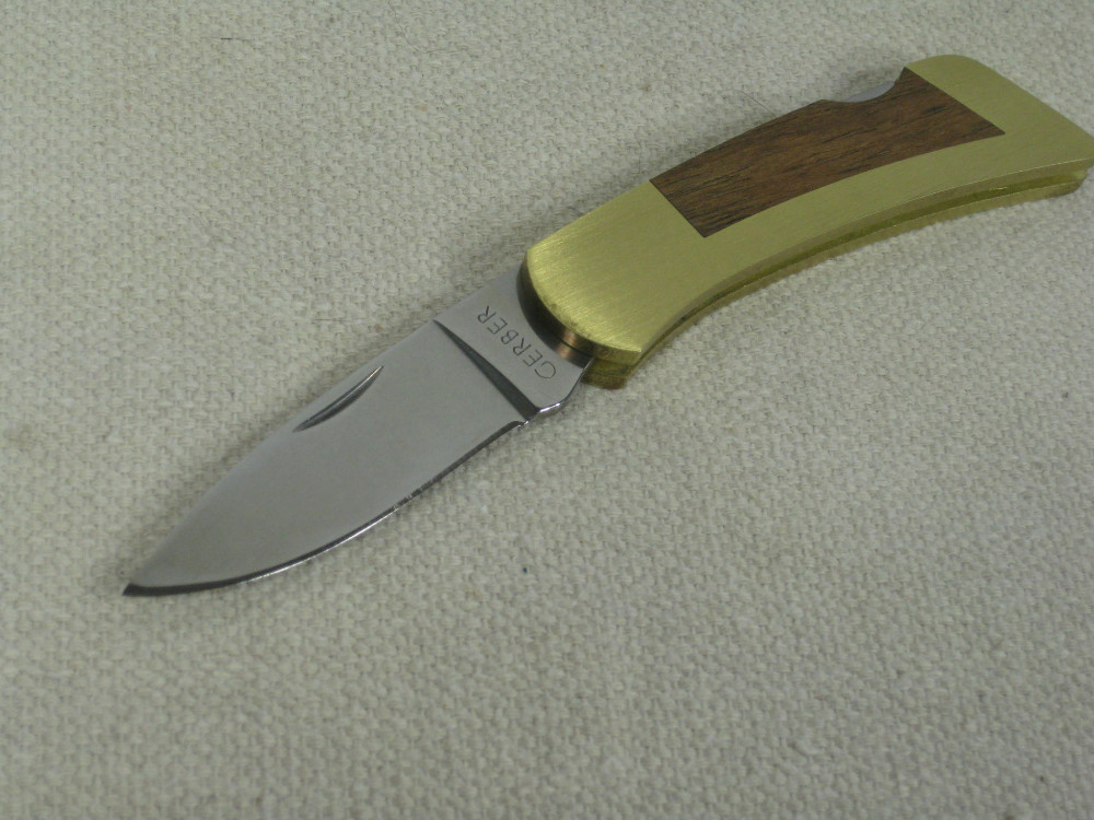 GERBER PORTLAND, OR. 97223 SPORTSMAN LOCKBACK KNIFE WITH SHEATH GERBER PORTLAND, OR. 97223 SPORTSMAN LOCKBACK KNIFE WITH SHEATH