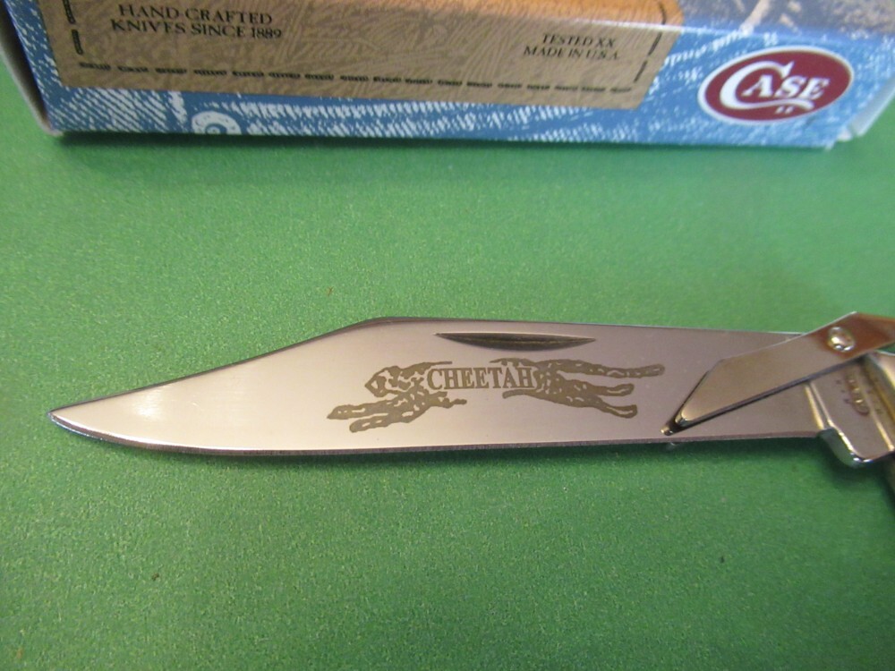 Case XX 2003 Cranberry Bone Silver Script Cheetah Pattern Case XX 2003 Cranberry Bone Silver Script Cheetah Pattern