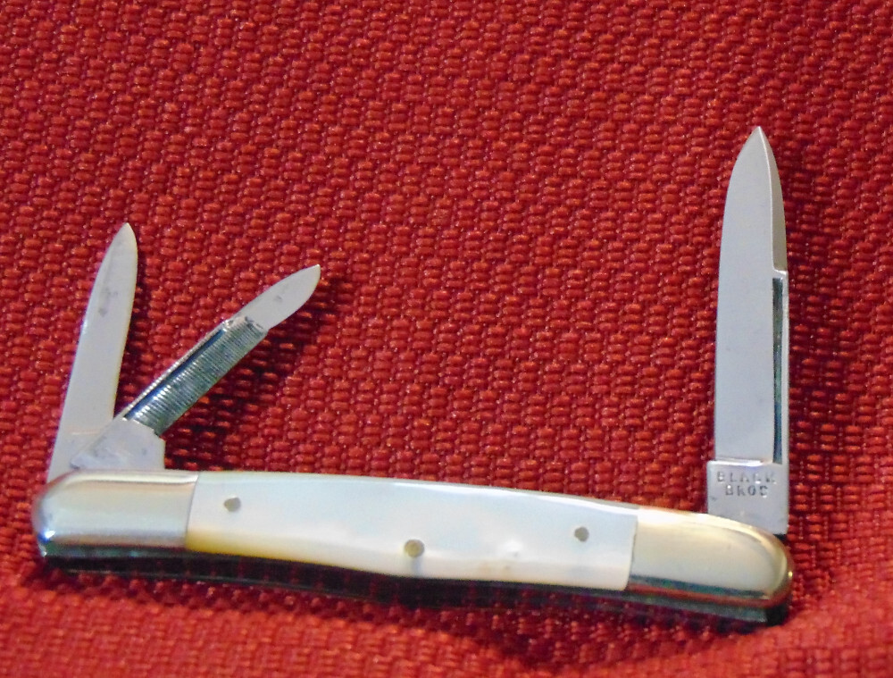 VINTAGE BLACK BROS. HUMPBACK WHITTLER GENUINE PEARL