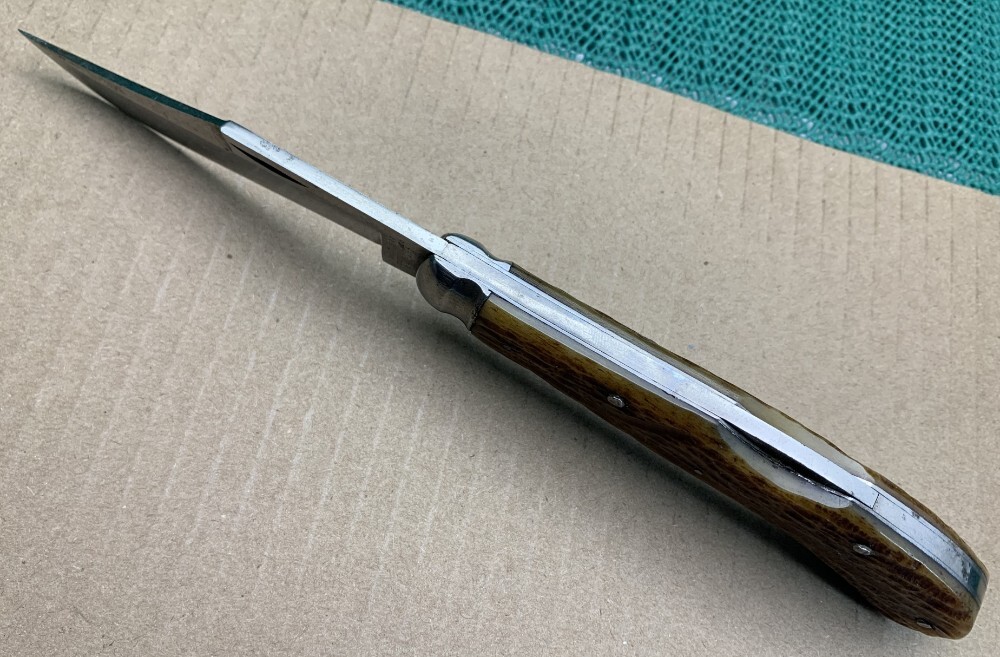 Wilbert Cutlery Co. Chicago. Lockback Saddlehorn Knife with Jig bone handle scales. (880)..(880)