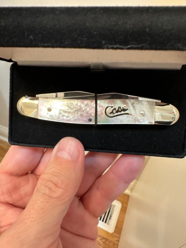 Case XX Silver Script Muskrat w/ Mother of Pearl handles. Mint