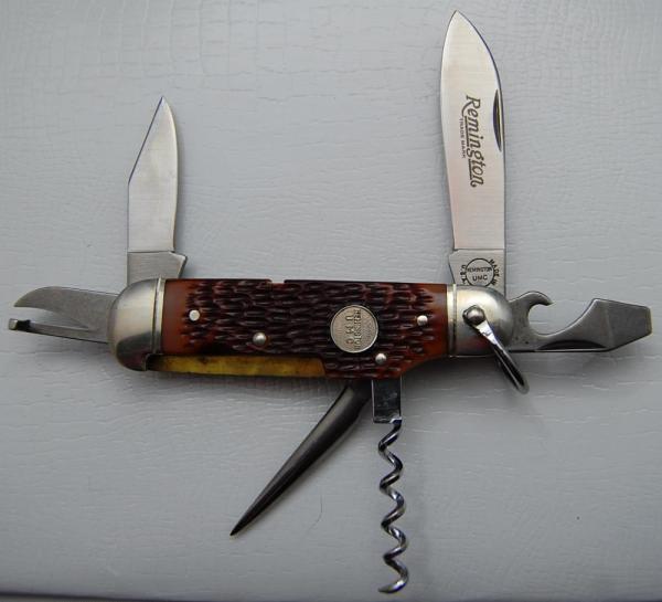 Remington Unofficial Scout With Brown Jigged Delrin Covers 3 5/8 Remington Unofficial Scout With Brown Jigged Delrin Covers 3 5/8