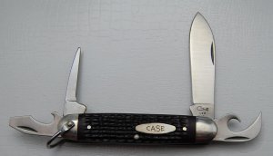 Case Unofficial Scout With Brown Jigged Delrin Covers 3 5/8