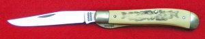 Schrade Scrimshawed Gunstock Trapper 
