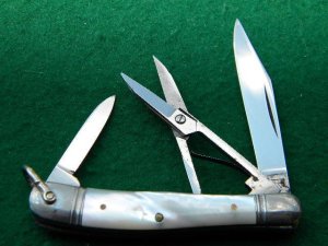 E Bruckmann Ohligs-Solingen, Germany Pearl Peanut w/Bail & Scissors - C. 1891-1956