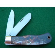Remington 1992 R1123-A Bullet Trapper Tenth Anniversary Knife in Presentation Tin - Mint Remington 1992 R1123-A Bullet Trapper Tenth Anniversary Knife in Presentation Tin - Mint