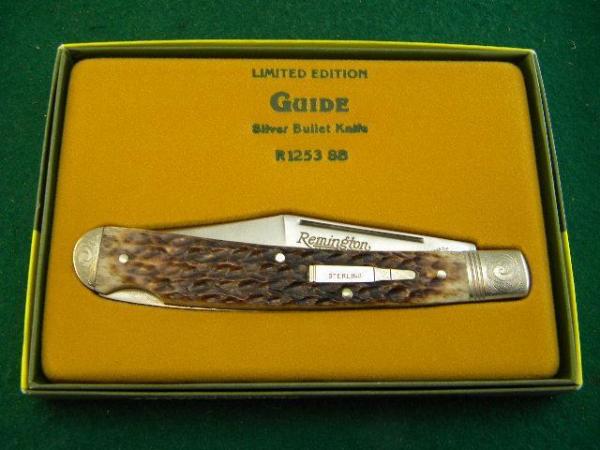 Remington UMC USA 1992 Genuine Bone R1253 Enraved Silver Bullet Guide Lockback Knife - NIB Remington UMC USA 1992 Genuine Bone R1253 Enraved Silver Bullet Guide Lockback Knife - NIB