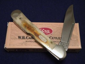 Case XX USA 1997 Smooth Molassis Bone 61549L SS Copperlock
