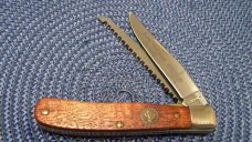 Schrade + USA LTD 2000/2001 Federal Duck Stamp Commemorative Linerlock Saw Trapper Knife in Box Schrade + USA LTD 2000/2001 Federal Duck Stamp Commemorative Linerlock Saw Trapper Knife in Box
