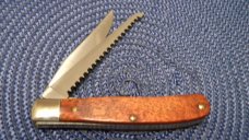 Schrade + USA LTD 2000/2001 Federal Duck Stamp Commemorative Linerlock Saw Trapper Knife in Box Schrade + USA LTD 2000/2001 Federal Duck Stamp Commemorative Linerlock Saw Trapper Knife in Box