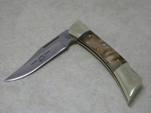 Case XX Stainless USA 7 Dot (1973) Curly Maple 7197 LSSP Shark Tooth Lockback Knife
