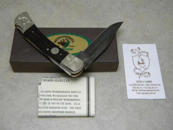 Weidmannsheil Germany Rosewood Boars Head Shield 512 Damascus Scrolled Large Lockback Knife in Box Weidmannsheil Germany Rosewood Boars Head Shield 512 Damascus Scrolled Large Lockback Knife in Box