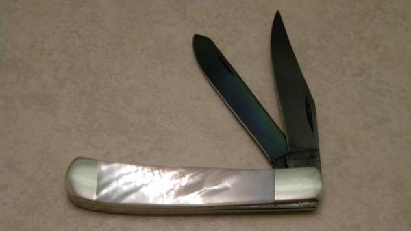 Bear MGC USA Genuine Mother of Pearl Trapper with Gun Blued Blades Bear MGC USA Genuine Mother of Pearl Trapper with Gun Blued Blades