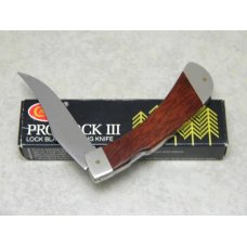 Case XX SS USA 7 Dot (1983) Laminated Wood New Grind Pro-Lock III Lockback Knife in Box Case XX SS USA 7 Dot (1983) Laminated Wood New Grind Pro-Lock III Lockback Knife in Box