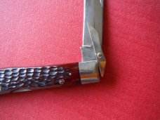Case 6111 Tested Green Bone Looks restored shield side is red bone.  OUCH.  