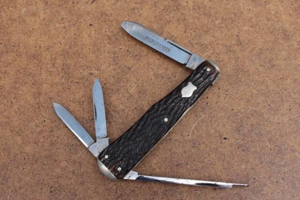 Winchester "Orange Blossom" w/ Etched Blade, Gunstock Lobster Whittler, tipped spear blade Winchester "Orange Blossom" w/ Etched Blade, Gunstock Lobster Whittler, tipped spear blade