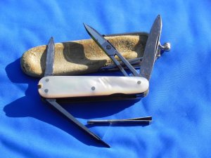 Antique J A Henckels 5 blade multiuse knife with flawless and fiery colorful Mother of Pearl handles