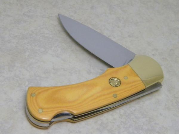 Puma Germany Stainless 715 Yellow Micarta 4 Star Lockback Knife c.1981 Puma Germany Stainless 715 Yellow Micarta 4 Star Lockback Knife c.1981