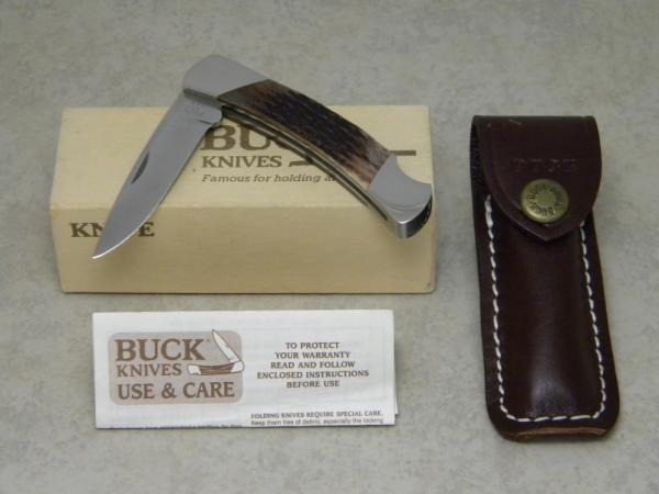 Buck USA Model # 501 Squire Brown Jigged Bone Lockback Knife & Pouch in Box c.1992 Buck USA Model # 501 Squire Brown Jigged Bone Lockback Knife & Pouch in Box c.1992