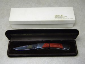 Buck USA Model # 501 Raccoon Gold Etch "Buck Bandit" 001 of 250 Wood Lockback Knife in Box c.1984