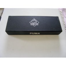 Mint Puma with Damascus blade and original box.