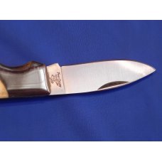 Vintage Frost Single Blade Lock back knife with Highly Detailed Scrimshaw Canadian Goose scene -NOS Vintage Frost Single Blade Lock back knife with Highly Detailed Scrimshaw Canadian Goose scene -NOS