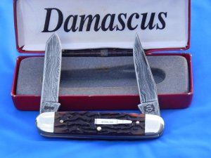 2000 Sterling Silver Remington Bullet pocket knife with Damascus Blades & Derlin handles -Nice one!
