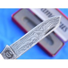 2000 Sterling Silver Remington Bullet pocket knife with Damascus Blades & Derlin handles -Nice one! 2000 Sterling Silver Remington Bullet pocket knife with Damascus Blades & Derlin handles -Nice one!