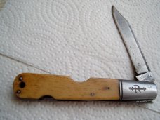 HARD TO COME BY DADDY RUSSELL LOCKBACK FISH SCALER