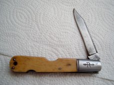 HARD TO COME BY DADDY RUSSELL LOCKBACK FISH SCALER