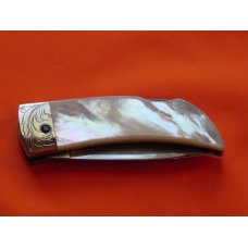 Boker "Cinch" Mdl# 1007E with flawless and Fiery Mother of Pearl handles Fancy Scroll Bolsters +Gem Boker "Cinch" Mdl# 1007E with flawless and Fiery Mother of Pearl handles Fancy Scroll Bolsters +Gem