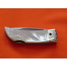 Boker "Cinch" Mdl# 1007E with flawless and Fiery Mother of Pearl handles Fancy Scroll Bolsters +Gem Boker "Cinch" Mdl# 1007E with flawless and Fiery Mother of Pearl handles Fancy Scroll Bolsters +Gem