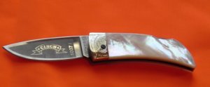 Boker "Cinch" Mdl# 1007E with flawless and Fiery Mother of Pearl handles Fancy Scroll Bolsters +Gem
