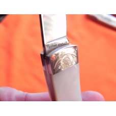 Boker "Cinch" Mdl# 1007E with flawless and Fiery Mother of Pearl handles Fancy Scroll Bolsters +Gem Boker "Cinch" Mdl# 1007E with flawless and Fiery Mother of Pearl handles Fancy Scroll Bolsters +Gem