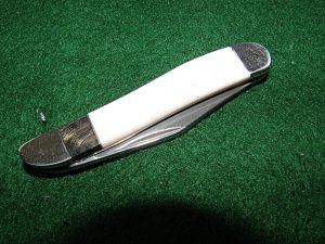 Mint White-Pink lines handles, B.M.I. Cut Co USA Peanut knife Navajo