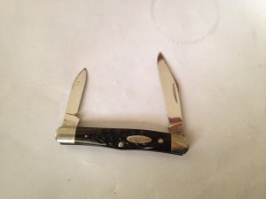 Case xx 6208 (two dots) bone handle; two blades. Big blade has a bit of rust on top edge.