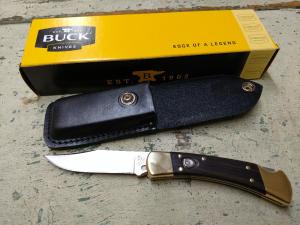 Buck 110 automatic dyomond wood. Right handed.