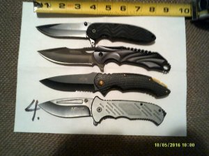 GROUP OF 4 TACTICAL FOLDING KNIVES.  